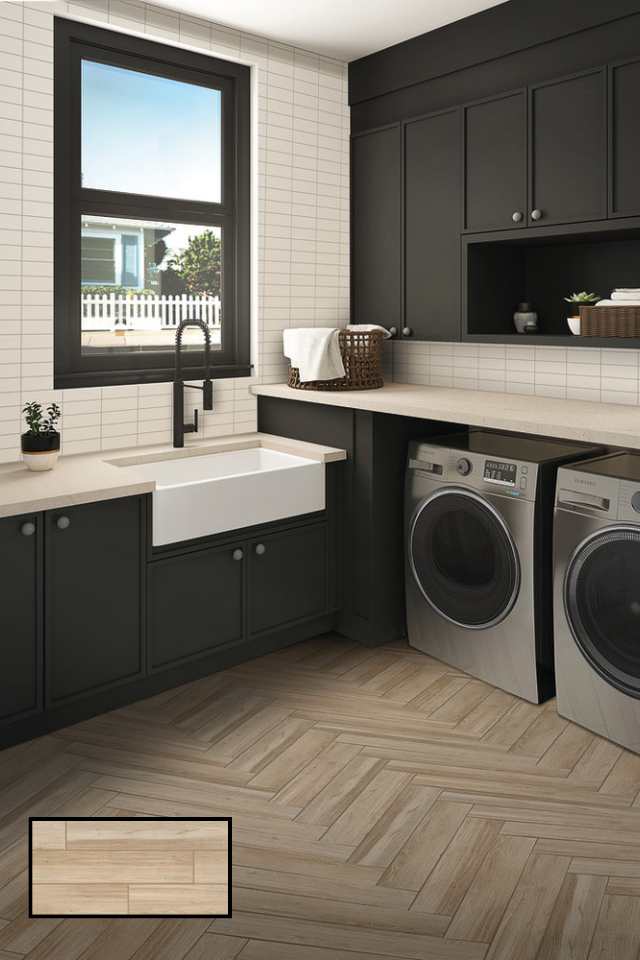 black and white laundry mudroom with big farmhouse sink and wood look tile herringbone floors